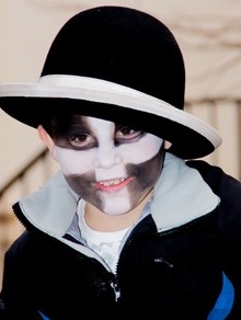 Boy's face painted with Cornish flag