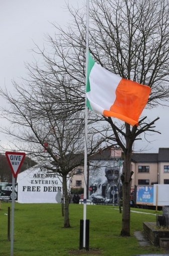 Flag flies at half-mast in the Bogside area of Derry