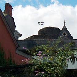 Launceston Castle flying our National Flag of Piran of the Tinners